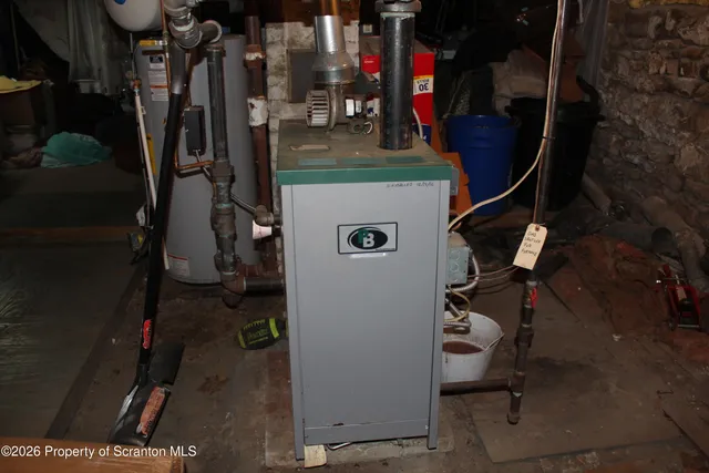 a bathroom with a sink mirror and vanity