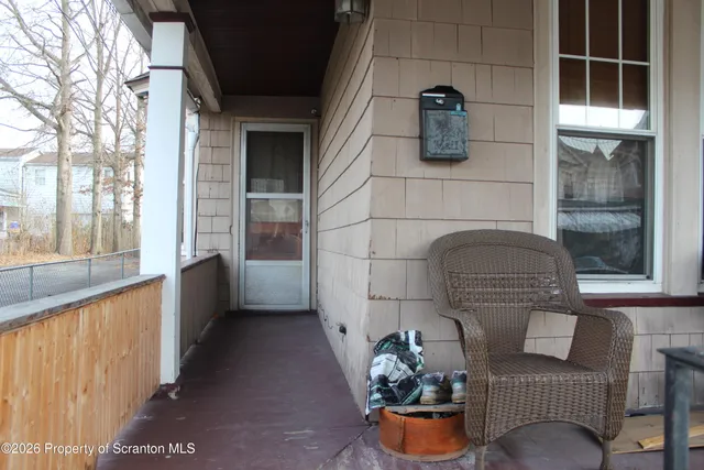 a room with furniture and a window