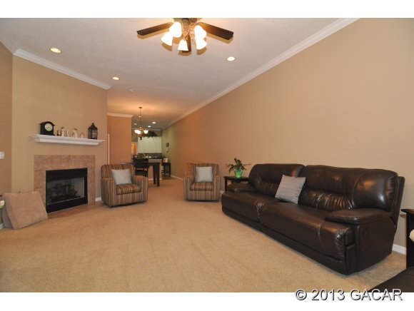 4952 Southwest 91st Way Gainesville, FL 32608 - Photo 3 of 24 Living Room w/ Gas Fireplace