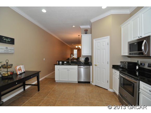 4952 Southwest 91st Way Gainesville, FL 32608 - Photo 7 of 24 Spacious Kitchen