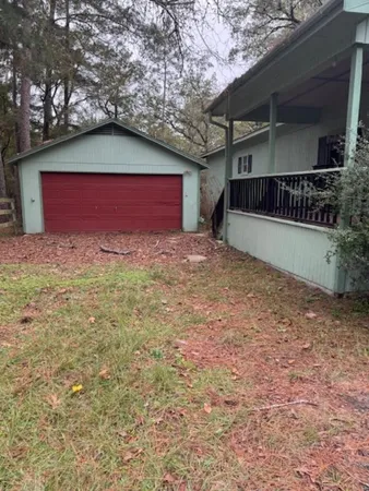 a view of backyard of house