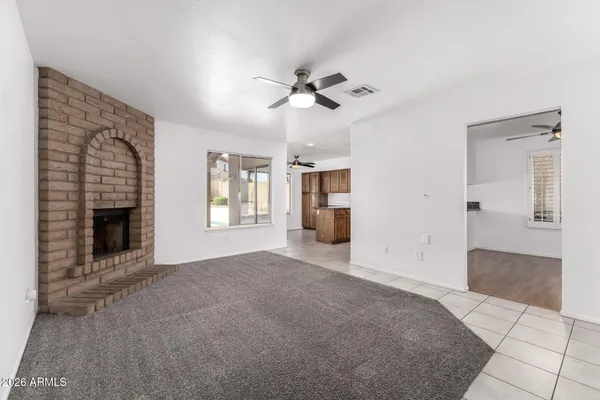 a kitchen with a table and chairs in it