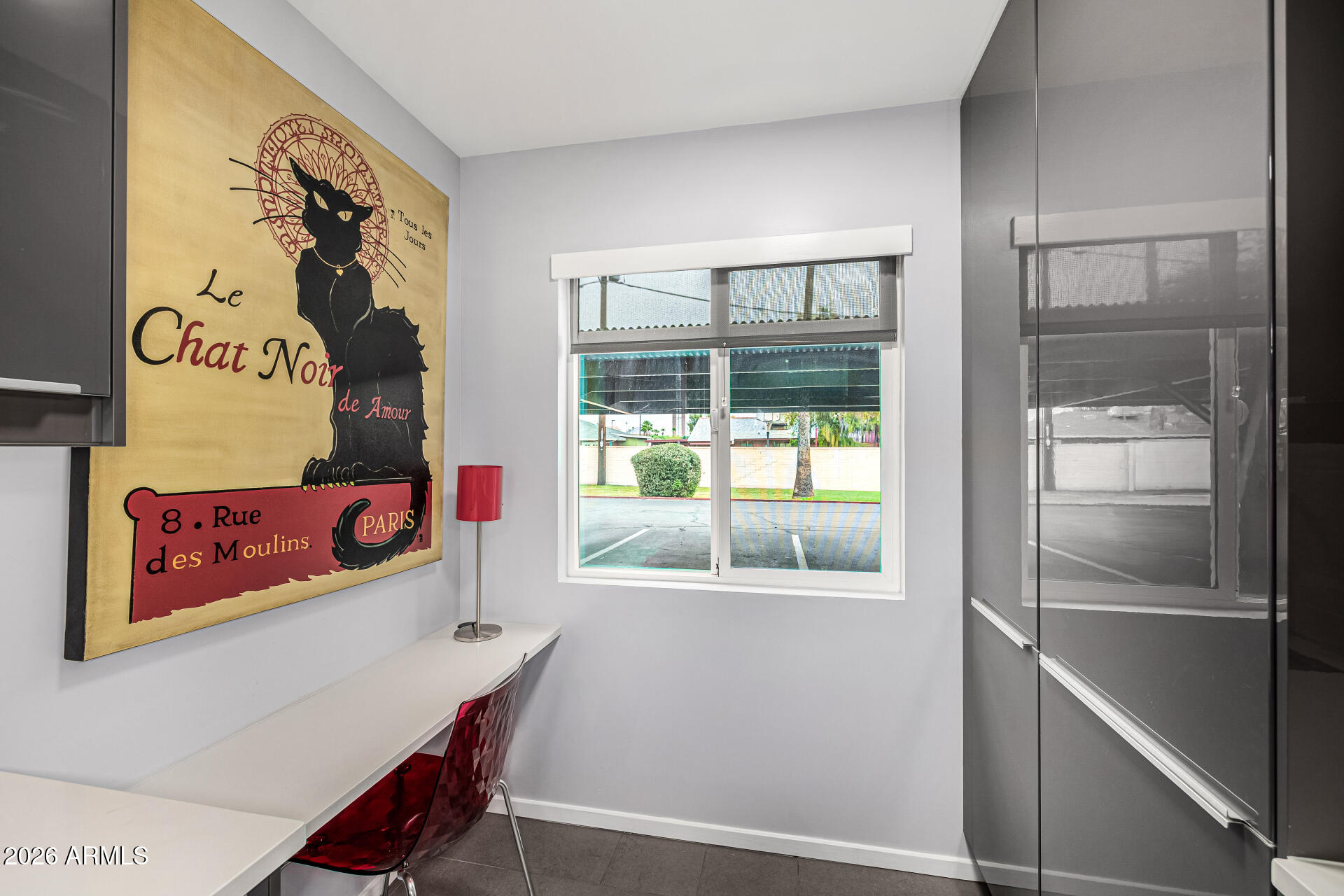 1107 West Osborn Road, Unit 118 Phoenix, AZ 85013 - Photo 6 of 18 a room with furniture and a window