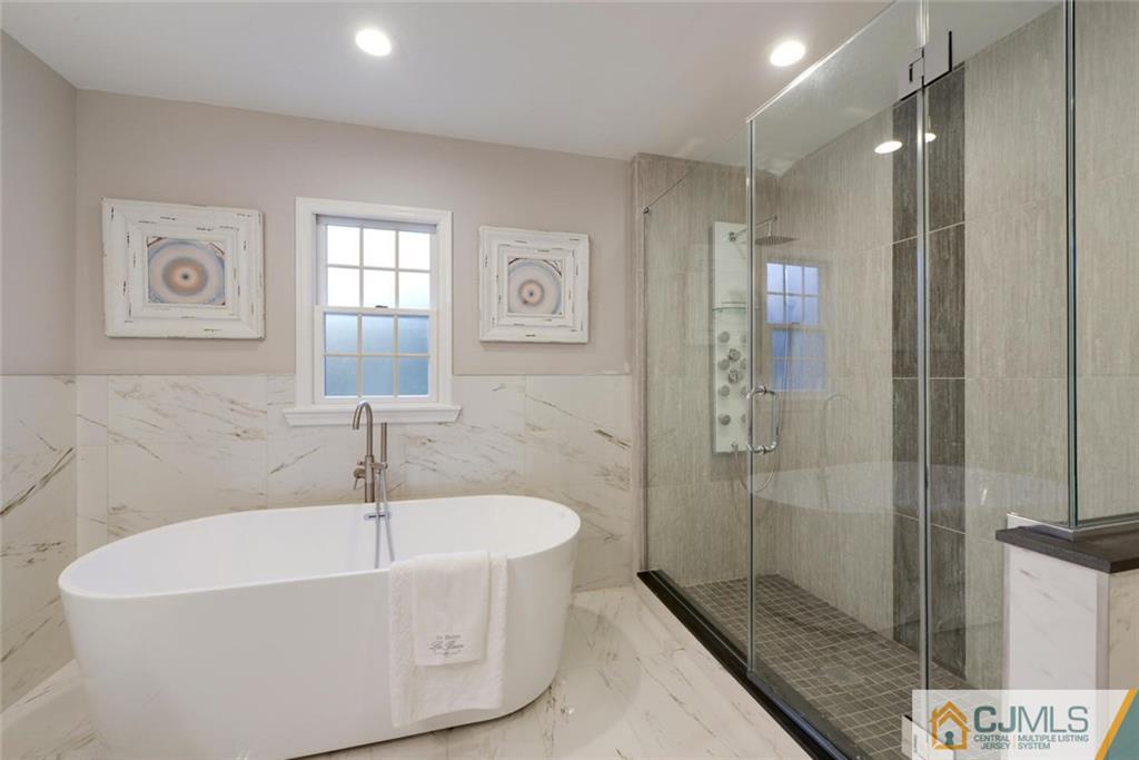 18 Old Ridge Road Monmouth Junction, NJ 08852 - Photo 23 of 25 a bathroom with a bathtub and shower
