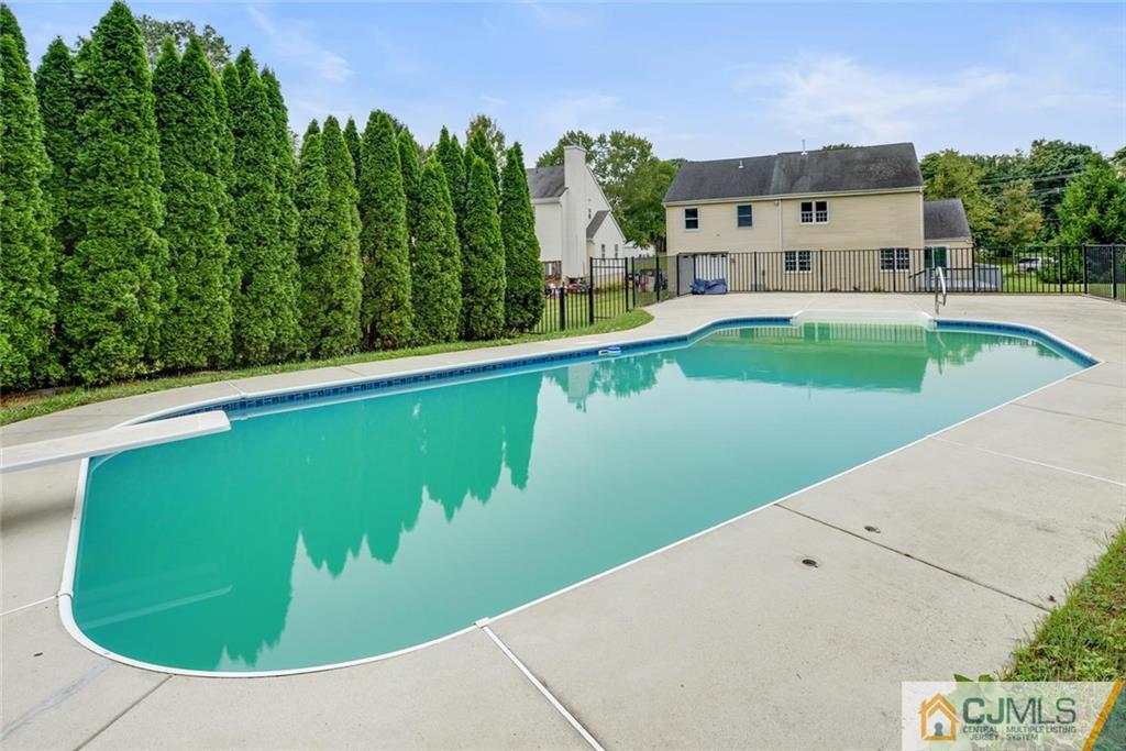 18 Old Ridge Road Monmouth Junction, NJ 08852 - Photo 25 of 25 a view of a swimming pool with a garden