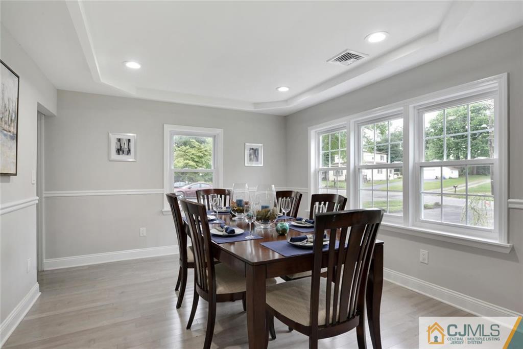 18 Old Ridge Road Monmouth Junction, NJ 08852 - Photo 4 of 25 a view of a dining room with furniture window and outside view