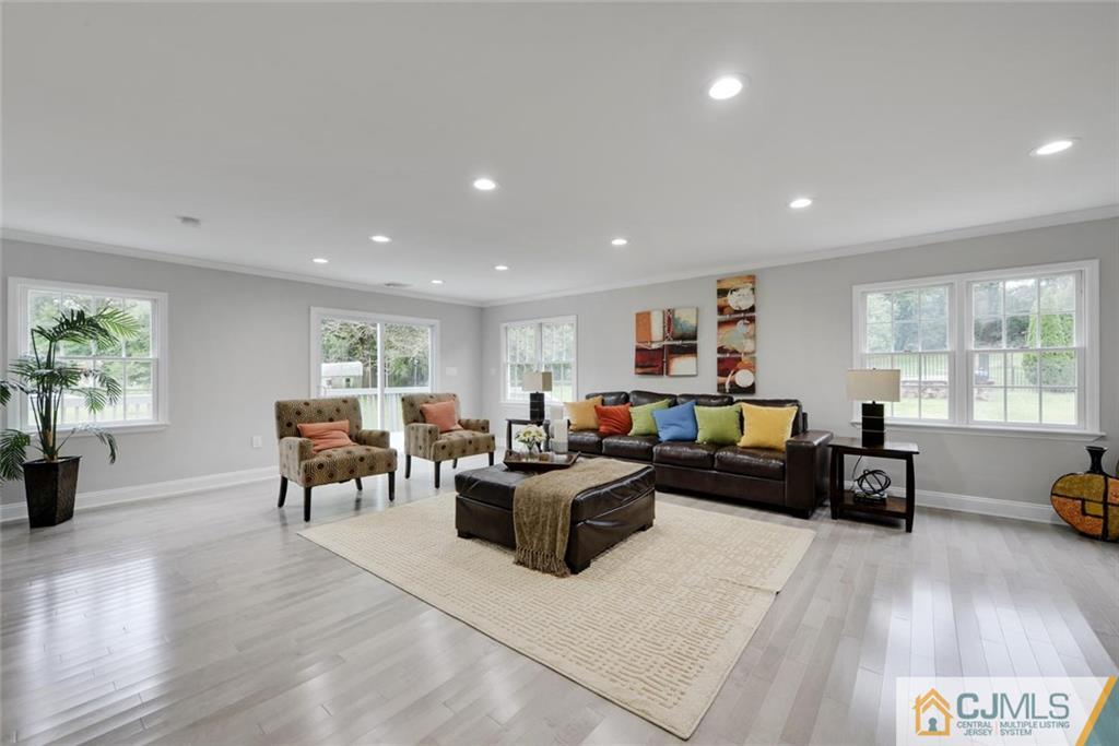 18 Old Ridge Road Monmouth Junction, NJ 08852 - Photo 10 of 25 a living room with furniture and a couch