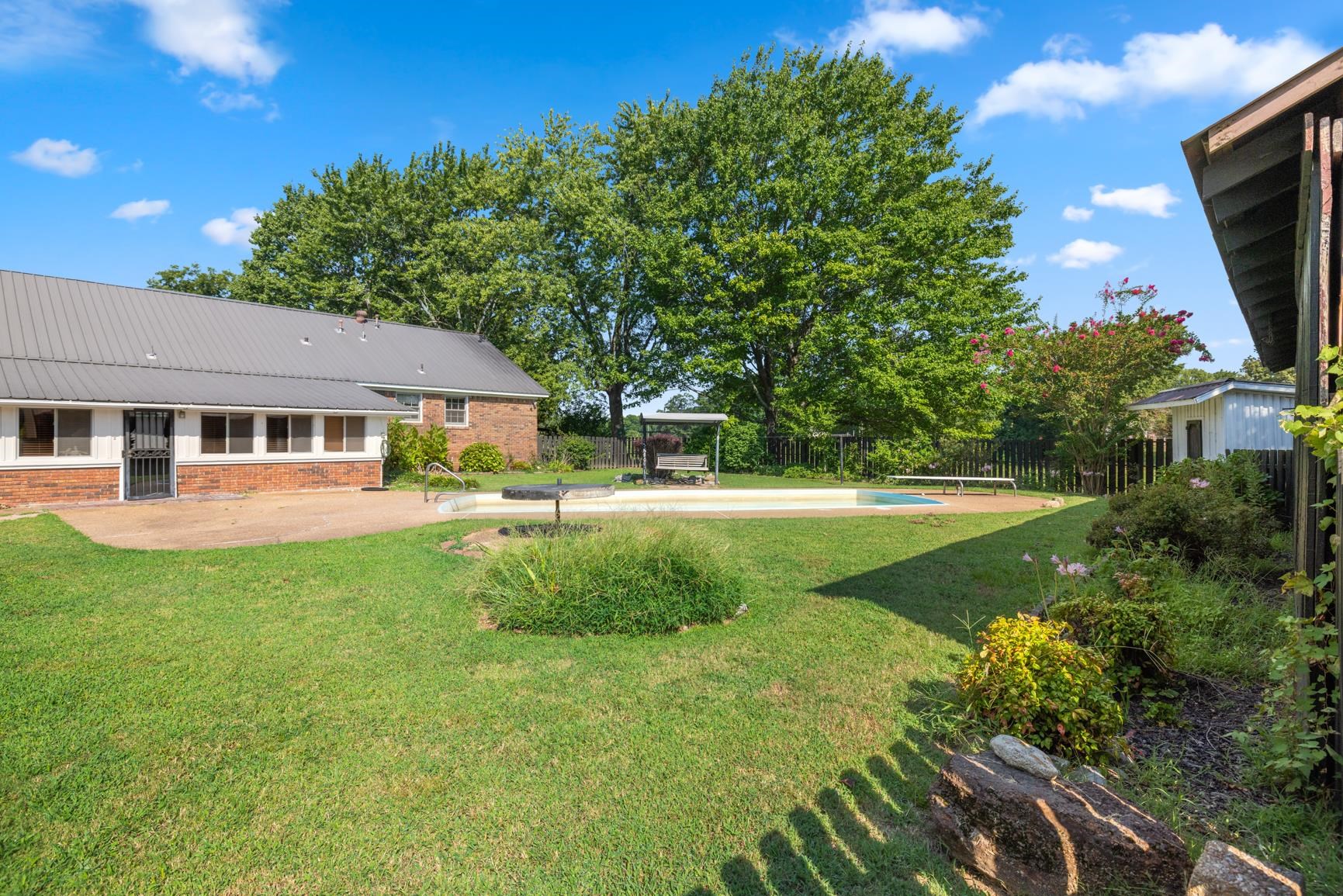 2930 Indian Creek Road Brighton, TN 38011 - Photo 34 of 39 a view of a house with a backyard