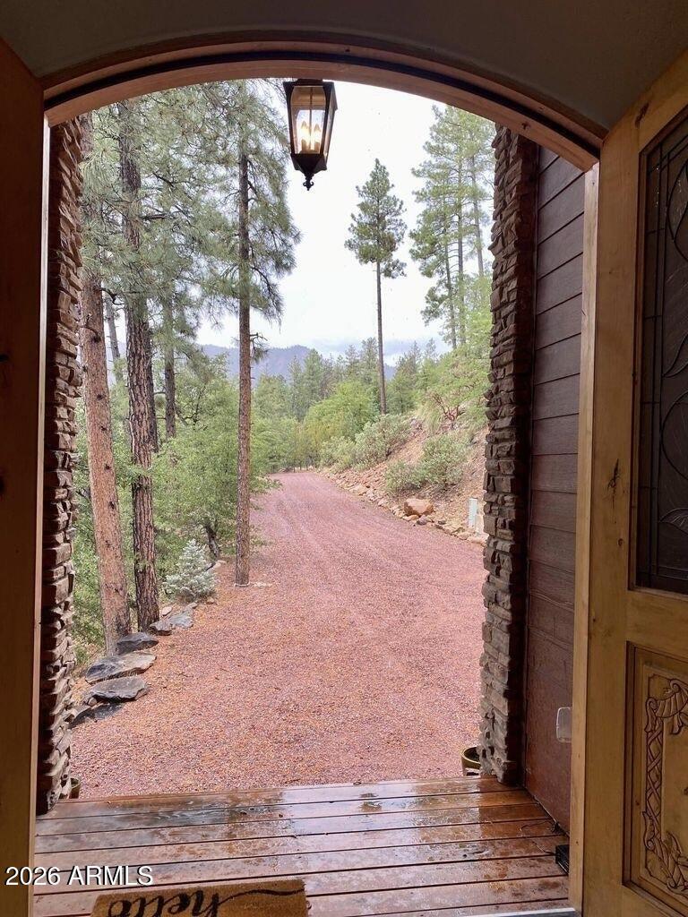415 East Rim Estates Trail Payson, AZ 85541 - Photo 65 of 76 a view of a porch with a floor to ceiling window