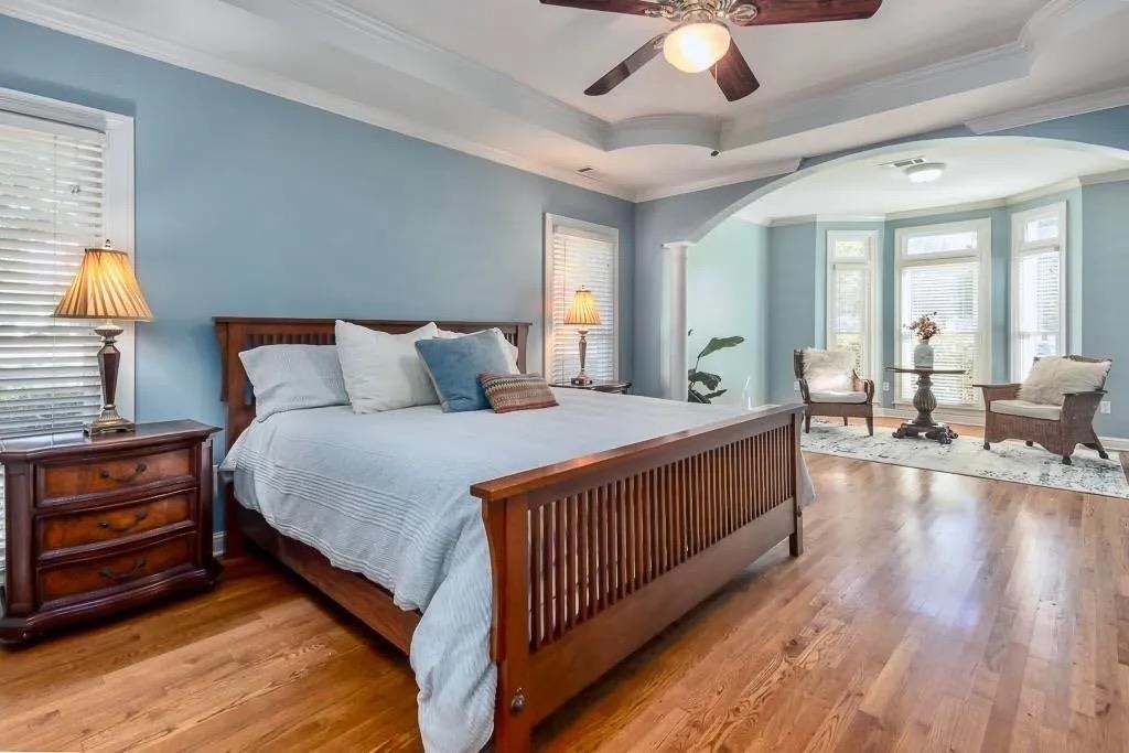 1893 Hartwell Manor West Collierville, TN 38017 - Photo 17 of 40 a large bedroom with bed and a chandelier