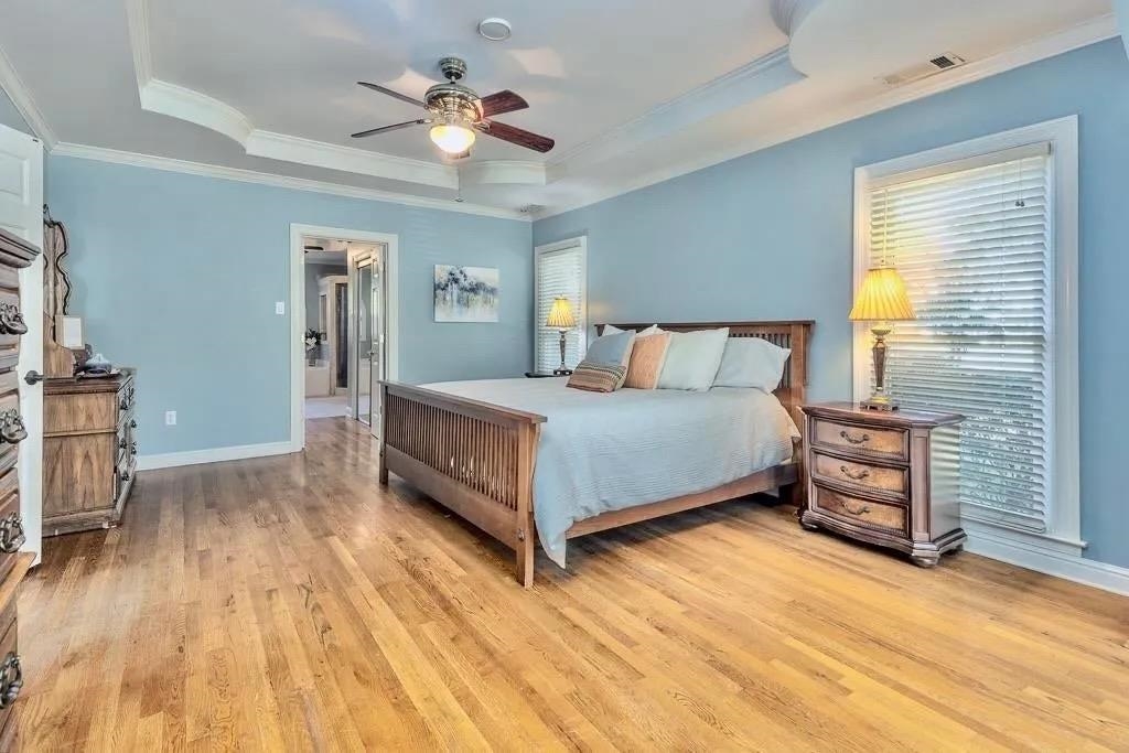 1893 Hartwell Manor West Collierville, TN 38017 - Photo 19 of 40 a bedroom with a bed and a chandelier