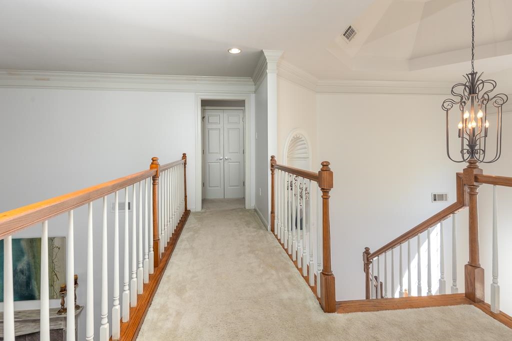 1893 Hartwell Manor West Collierville, TN 38017 - Photo 26 of 40 a view of a hallway with wooden floor and stairs
