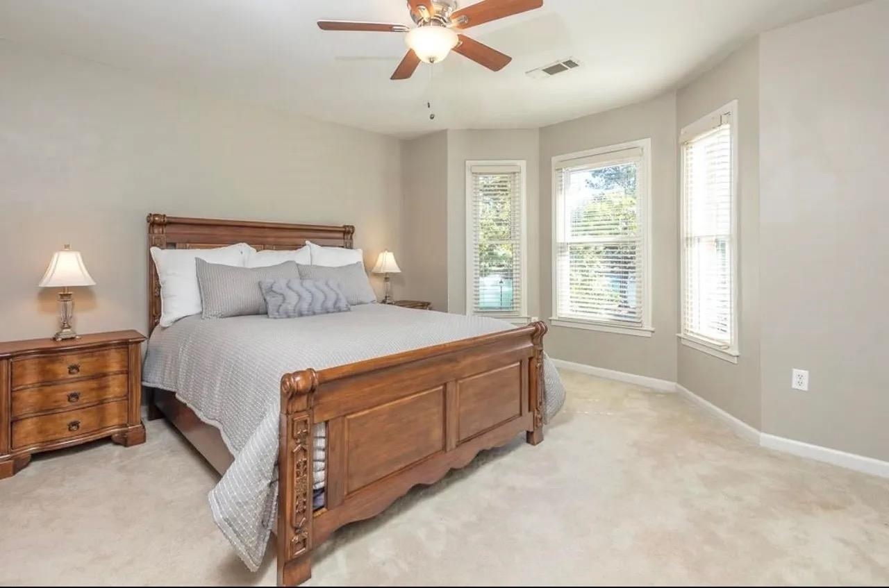 1893 Hartwell Manor West Collierville, TN 38017 - Photo 30 of 40 a spacious bedroom with a bed and a window