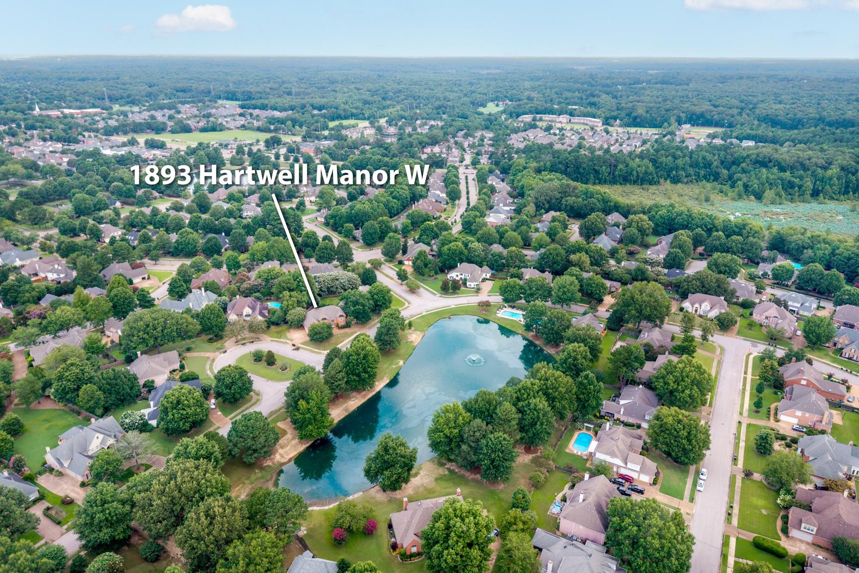 1893 Hartwell Manor West Collierville, TN 38017 - Photo 36 of 40 Aerial view of property's location with property parcel outlined, nearby suburban area, and a large body of water