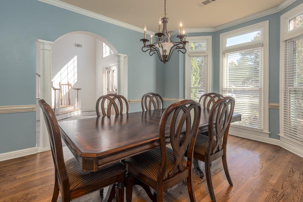 1893 Hartwell Manor West Collierville, TN 38017 - Photo 6 of 40 a view of a dining room with furniture window and wooden floor