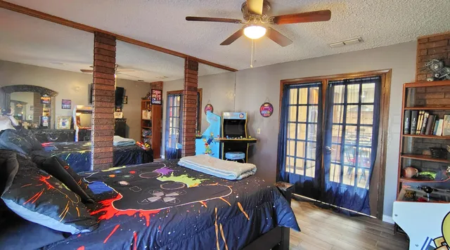 a bed room with furniture and a window