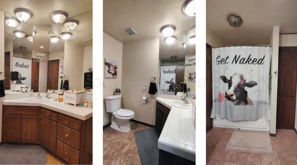 a spacious bathroom with a sink vanity and toilet