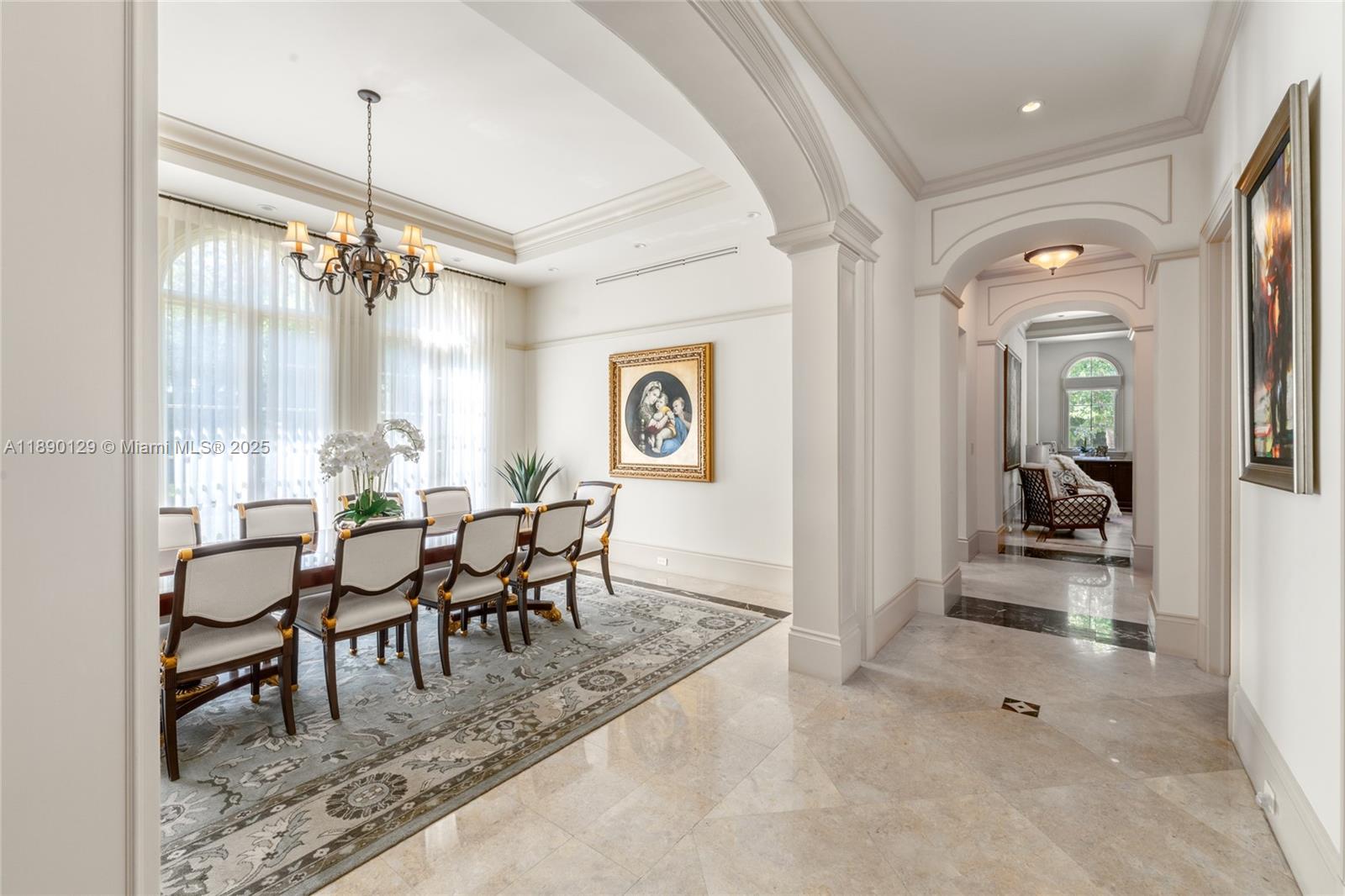 5785 Southwest 96th Street Pinecrest, FL 33156 - Photo 11 of 34 a view of a dining room with furniture
