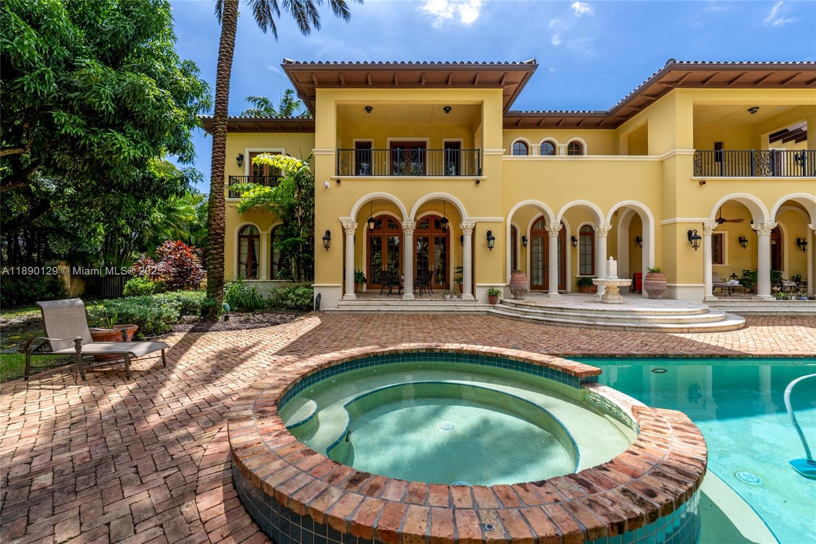 5785 Southwest 96th Street Pinecrest, FL 33156 - Photo 28 of 34 a view of swimming pool with outdoor seating