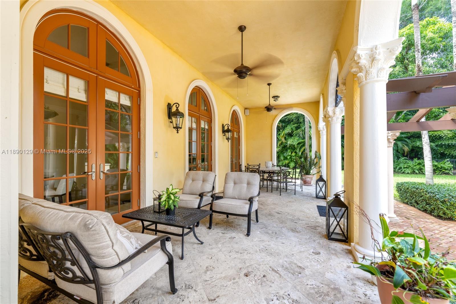 5785 Southwest 96th Street Pinecrest, FL 33156 - Photo 29 of 34 a building outdoor space with patio furniture