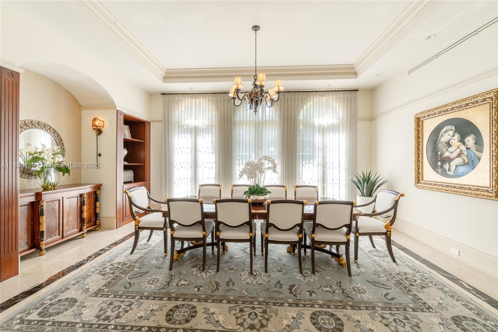 5785 Southwest 96th Street Pinecrest, FL 33156 - Photo 10 of 34 a view of a dining room with furniture and window