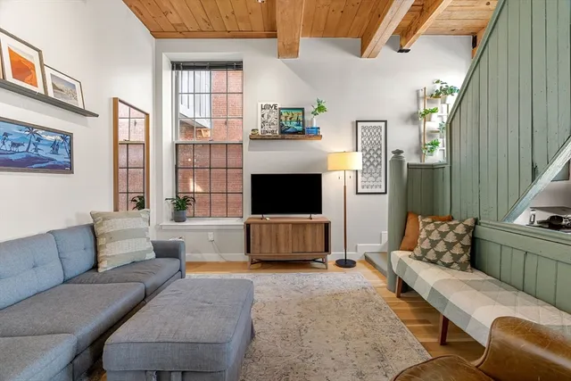 a living room with furniture and a couch