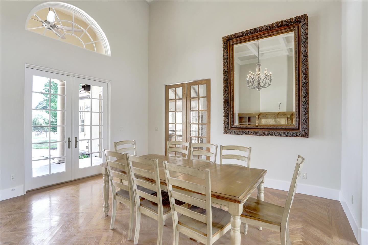 1120 Wallace Road Placerville, CA 95667 - Photo 14 of 70 a dining room with wooden floor and a chandelier