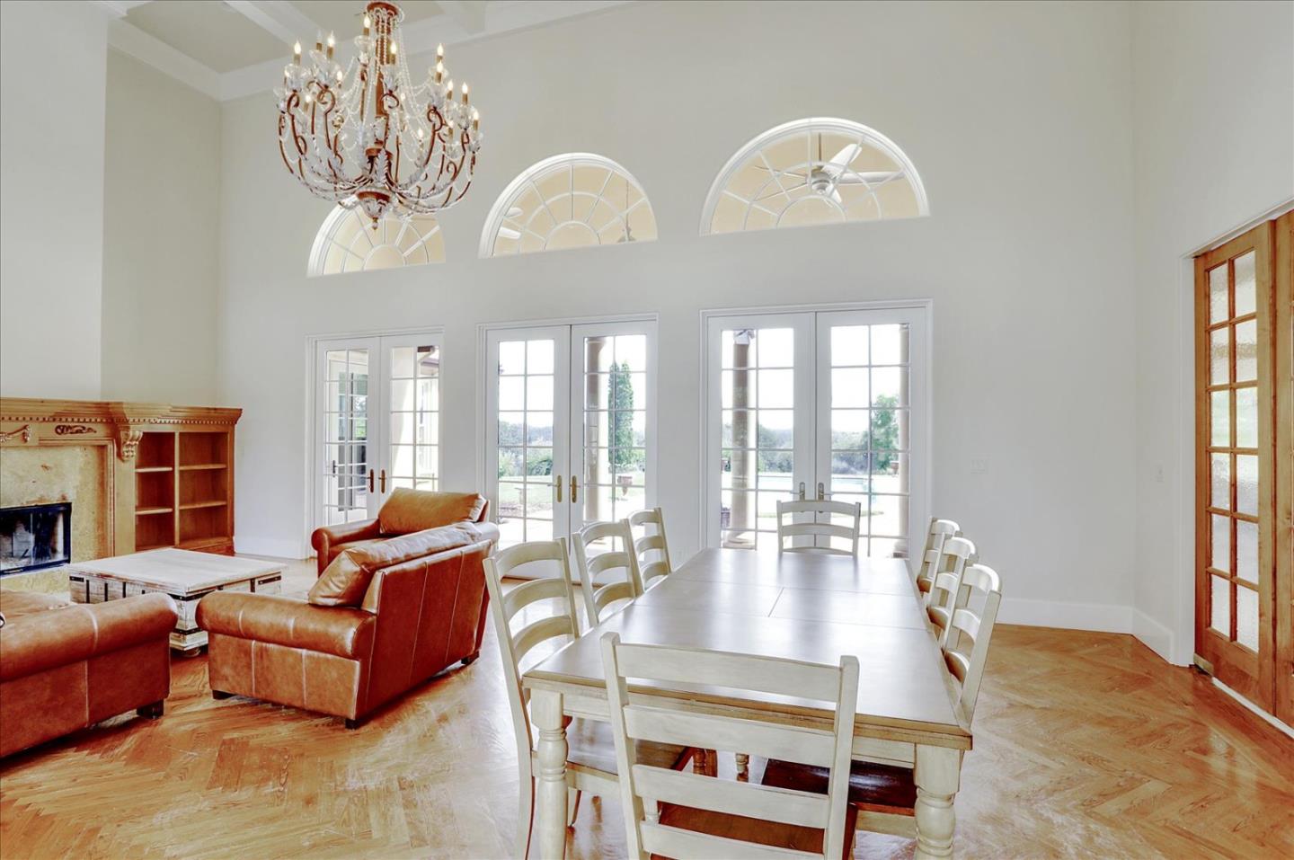 1120 Wallace Road Placerville, CA 95667 - Photo 15 of 70 a living room with furniture a chandelier and a large window