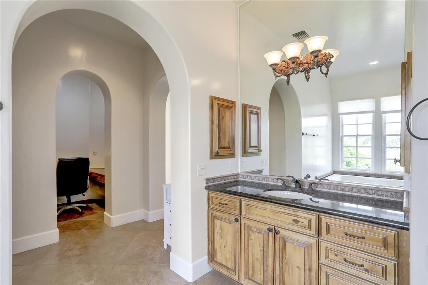 1120 Wallace Road Placerville, CA 95667 - Photo 31 of 70 a bathroom with a double vanity sink and a mirror