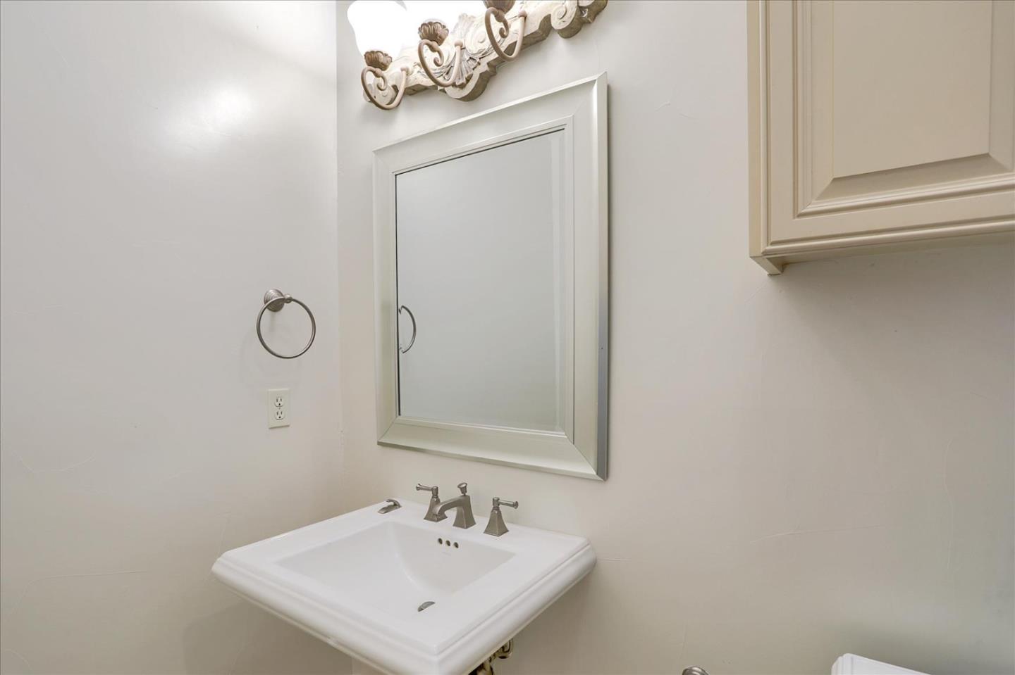 1120 Wallace Road Placerville, CA 95667 - Photo 37 of 70 a bathroom with a sink a mirror and vanity