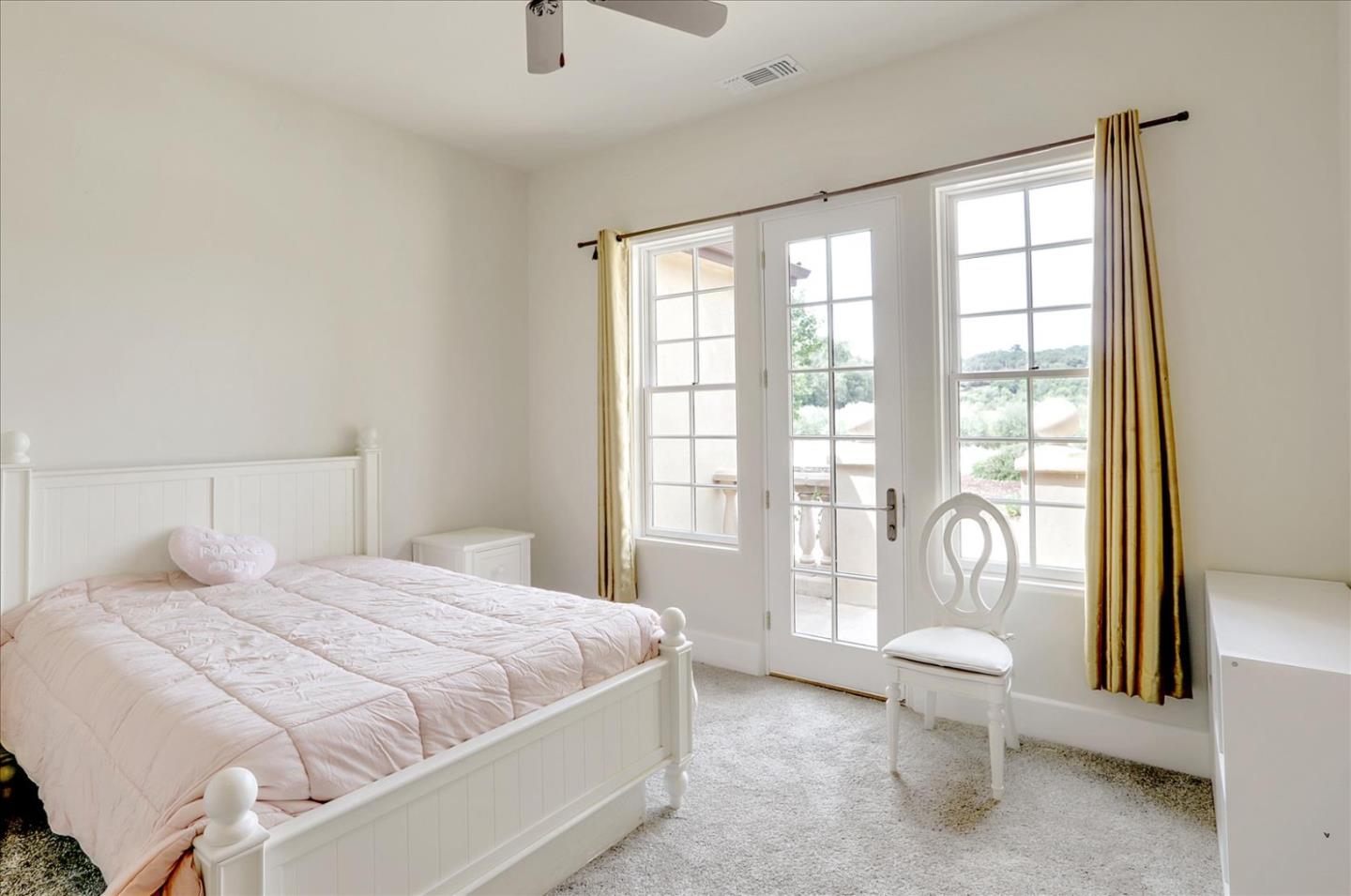 1120 Wallace Road Placerville, CA 95667 - Photo 40 of 70 a bedroom with a large bed and a large window