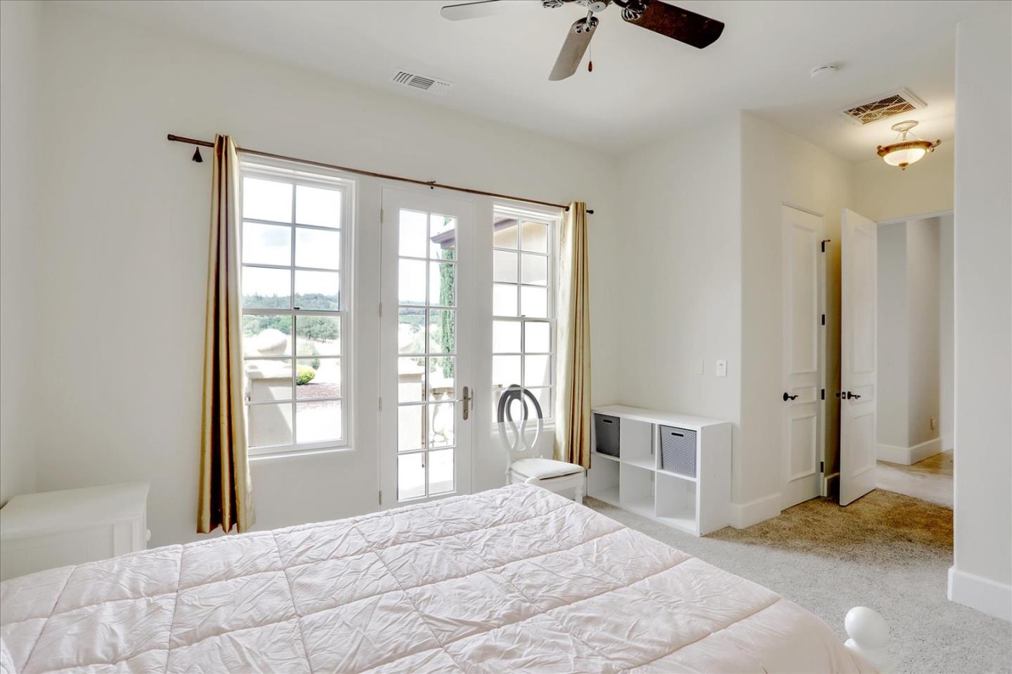 1120 Wallace Road Placerville, CA 95667 - Photo 41 of 70 a bedroom with a bed and dresser with mirror