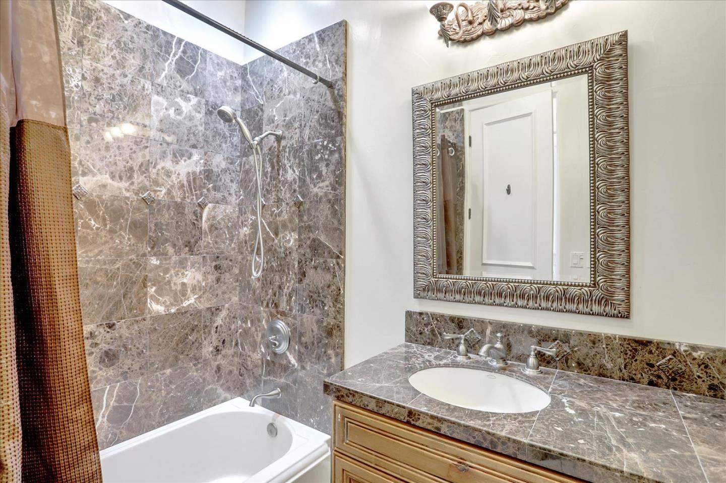 1120 Wallace Road Placerville, CA 95667 - Photo 42 of 70 a bathroom with a granite countertop sink and a mirror