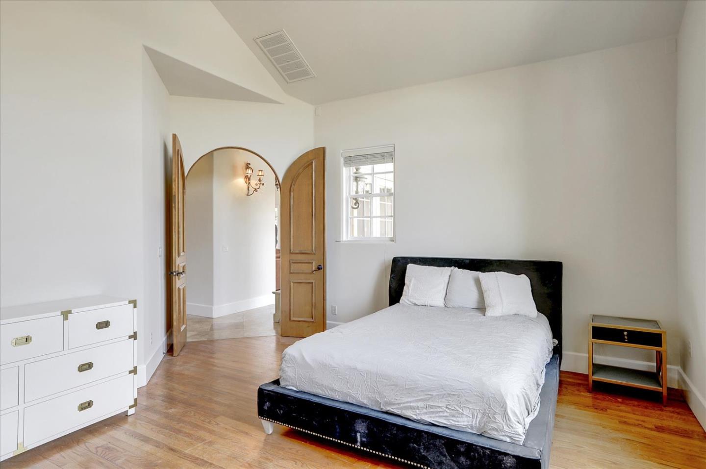 1120 Wallace Road Placerville, CA 95667 - Photo 46 of 70 a bedroom with a bed and wooden floor