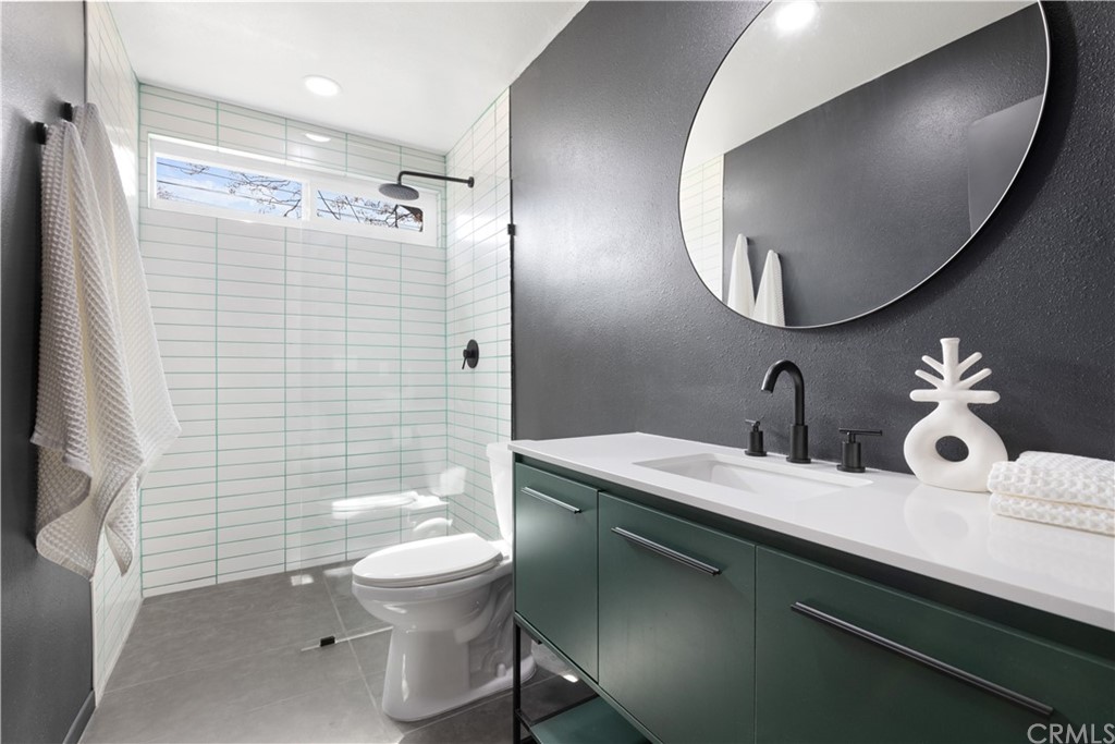 61589 El Reposo Street Joshua Tree, CA 92252 - Photo 12 of 15 a bathroom with a sink a toilet and shower