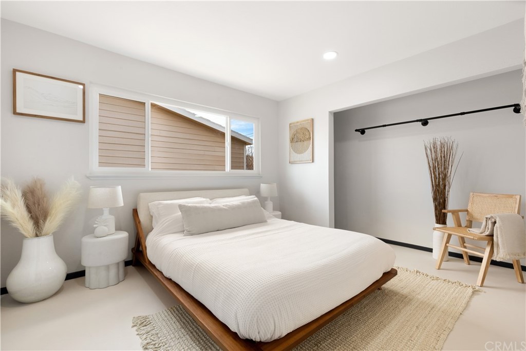 61589 El Reposo Street Joshua Tree, CA 92252 - Photo 7 of 15 a bedroom with a bed and a window