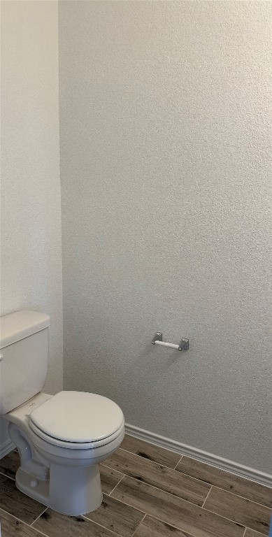 253 Redonda Drive Liberty Hill, TX 78642 - Photo 16 of 18 a white toilet sitting next to a shower