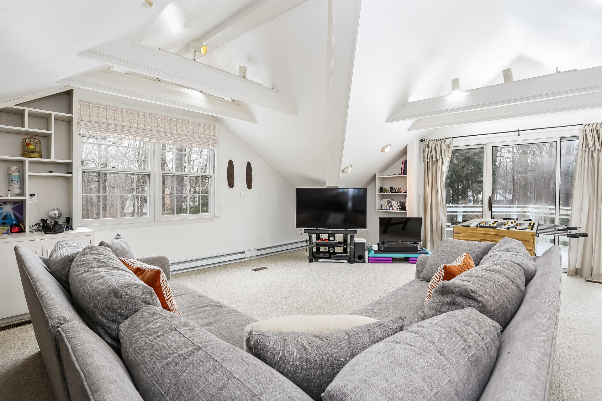 42 Valley Road New Canaan, CT 06840 - Photo 11 of 30 a living room with furniture and a flat screen tv