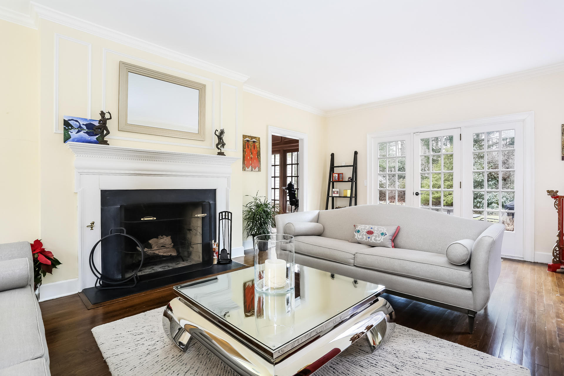 42 Valley Road New Canaan, CT 06840 - Photo 13 of 30 a living room with furniture and a fireplace