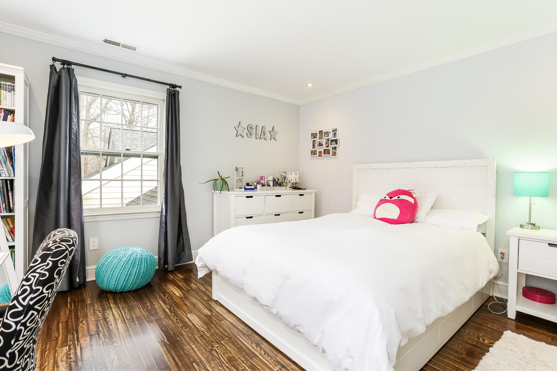 42 Valley Road New Canaan, CT 06840 - Photo 20 of 30 a bedroom with a bed and a large window
