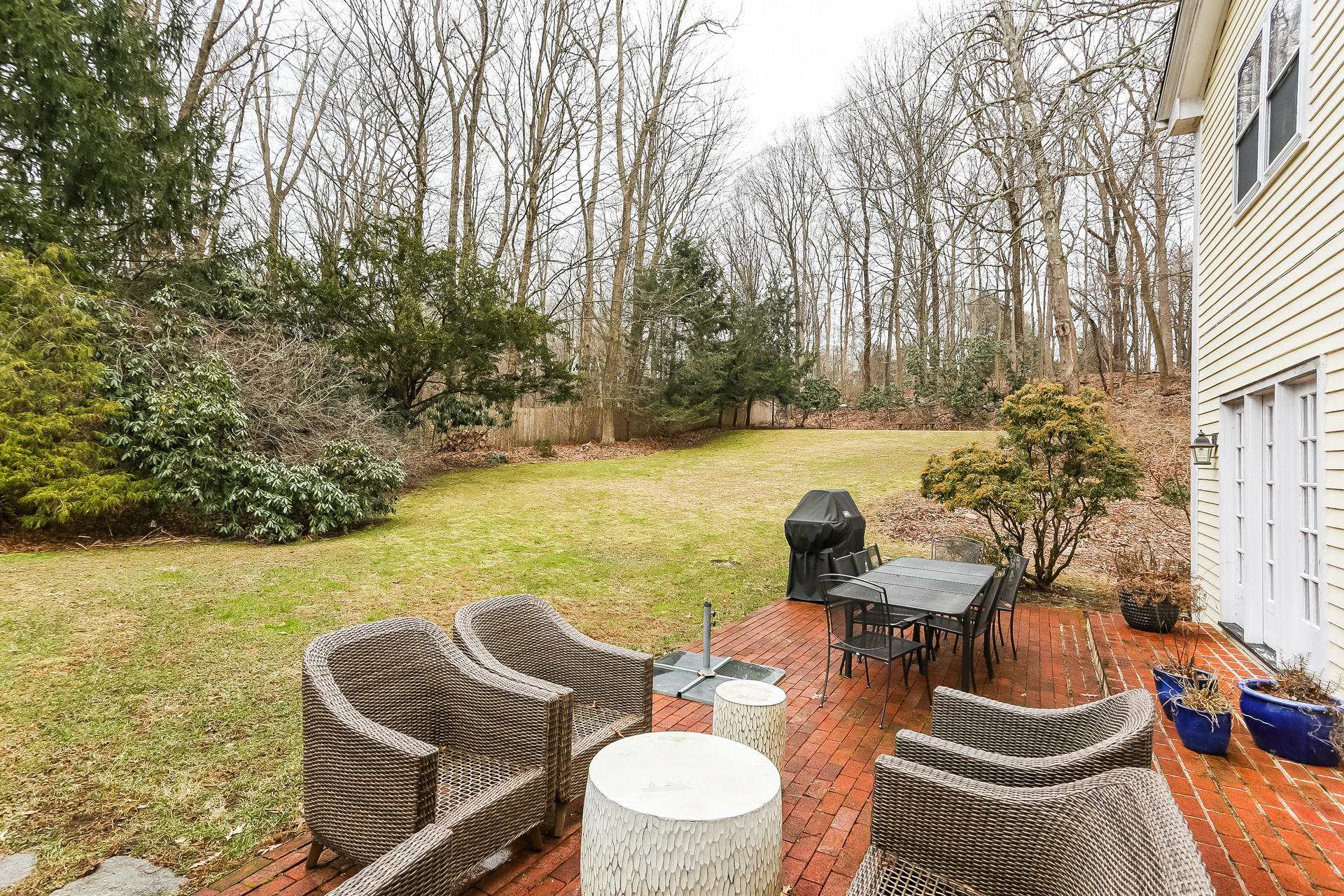 42 Valley Road New Canaan, CT 06840 - Photo 26 of 30 a view of a chairs and table in patio