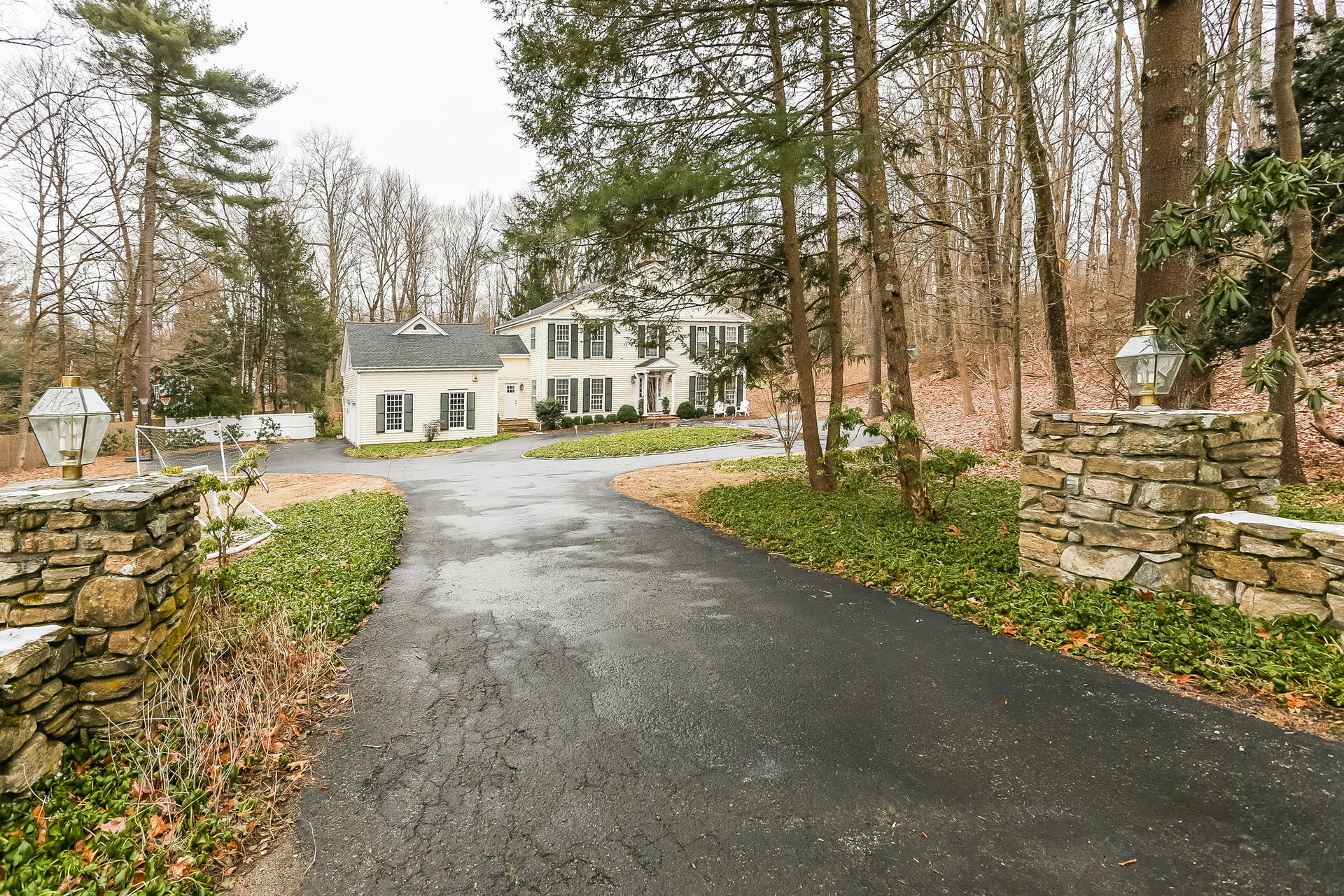 42 Valley Road New Canaan, CT 06840 - Photo 27 of 30 a view of a street with houses on both side