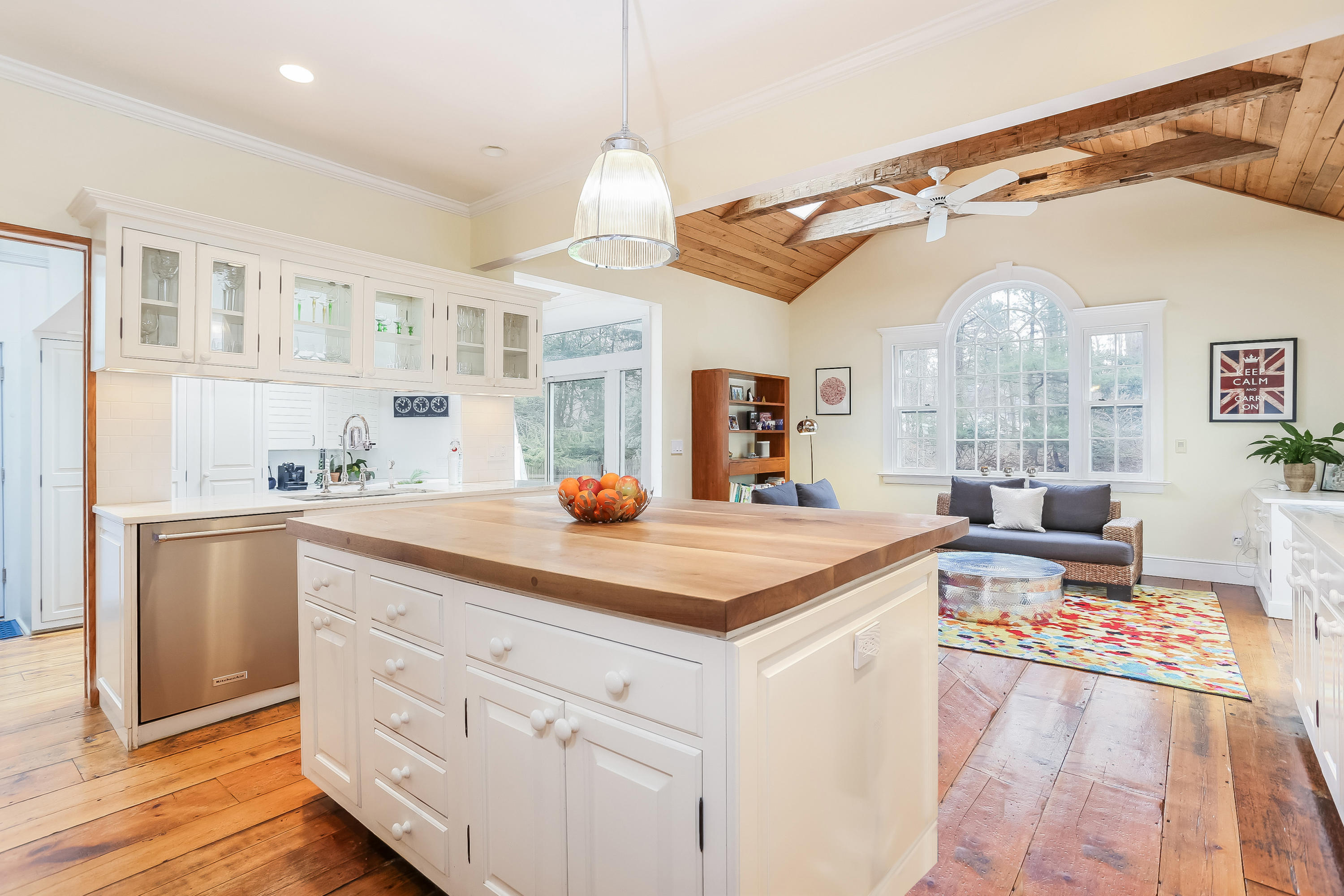 42 Valley Road New Canaan, CT 06840 - Photo 3 of 30 a kitchen with stainless steel appliances granite countertop a sink and cabinets