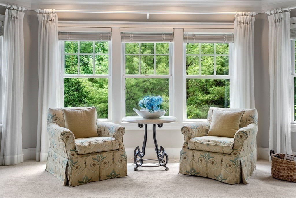 96 Beard Way Needham, MA 02492 - Photo 17 of 39 a living room with furniture and a large window