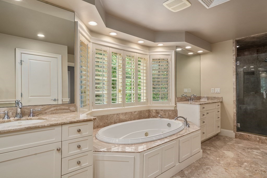 96 Beard Way Needham, MA 02492 - Photo 19 of 39 a bathroom with a granite countertop sink mirror bathtub and shower