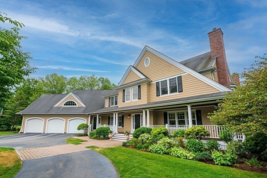 96 Beard Way Needham, MA 02492 - Photo 2 of 39 a house view with a garden space