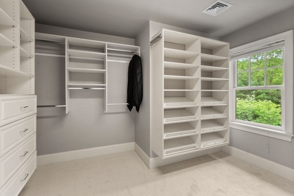 96 Beard Way Needham, MA 02492 - Photo 21 of 39 a view of an empty walk in closet