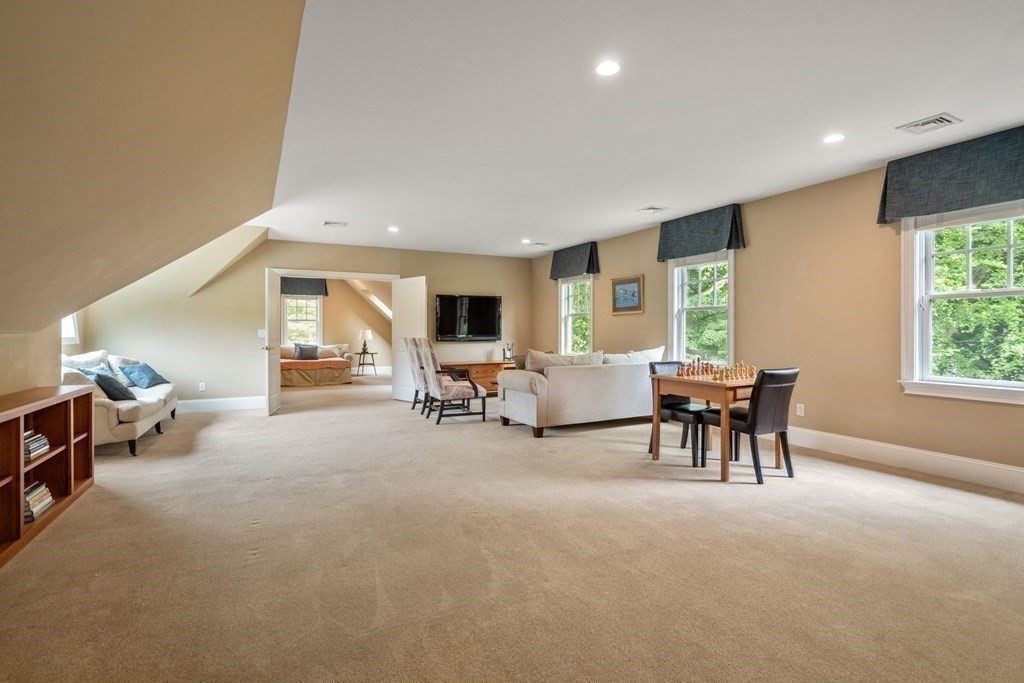 96 Beard Way Needham, MA 02492 - Photo 26 of 39 a living room with furniture and a large window
