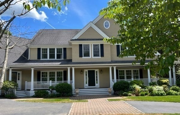 96 Beard Way Needham, MA 02492 - Photo 3 of 39 a front view of a house with garden