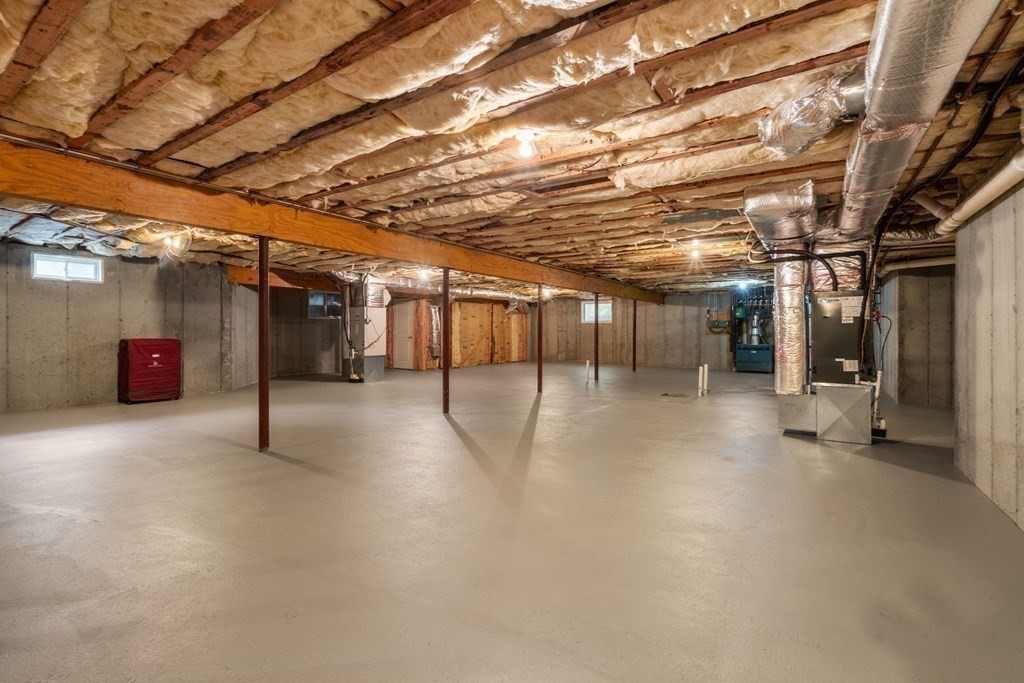 96 Beard Way Needham, MA 02492 - Photo 32 of 39 a view of empty room with wooden ceiling